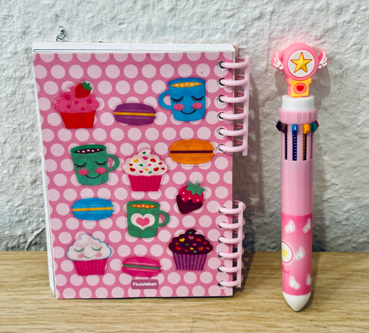 Notizheft + Buntstift