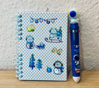 Notizheft + Buntstift