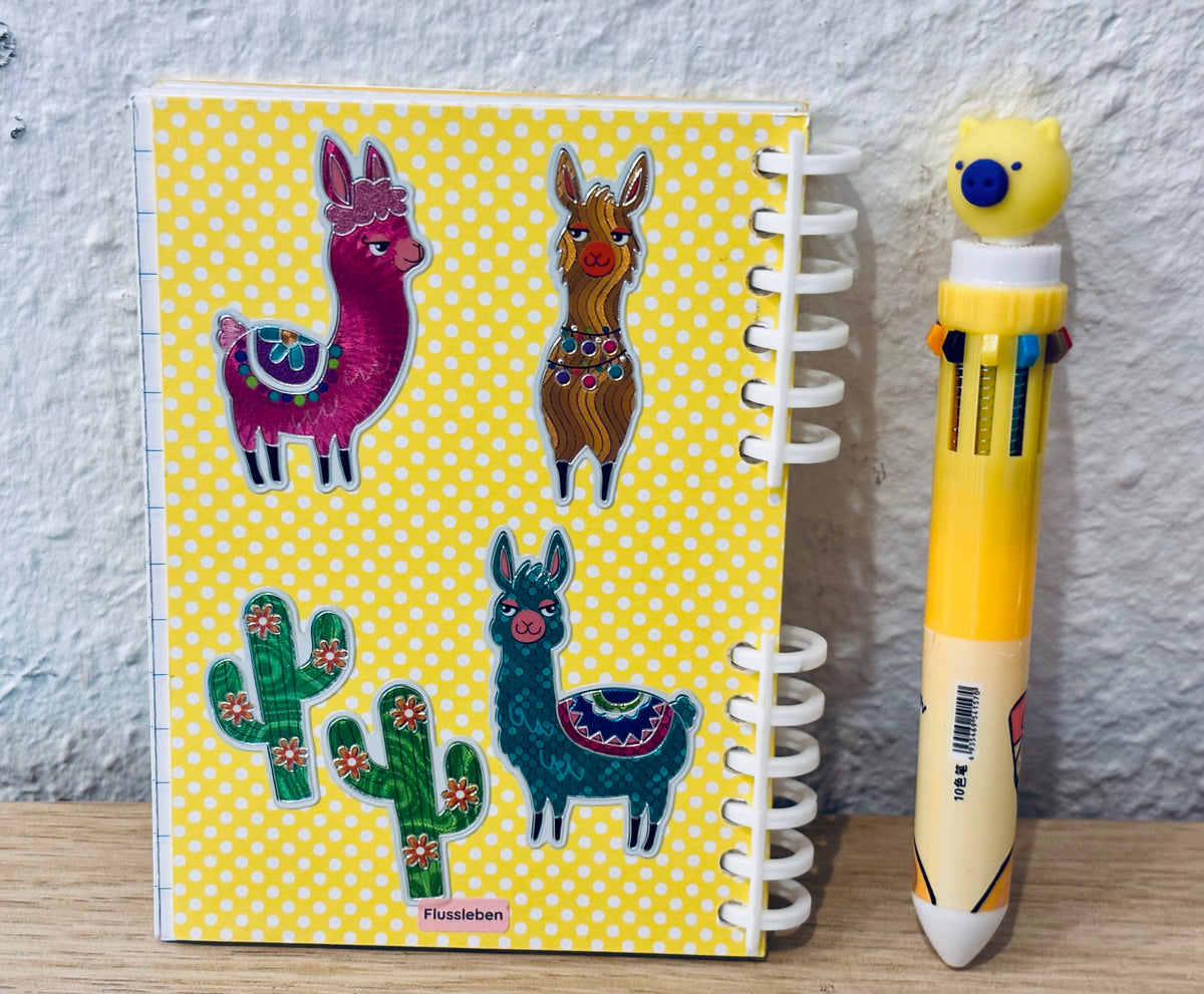Notizheft + Buntstift